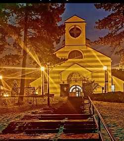 Church of the Transfiguration of the Lord at night with decorative lighting