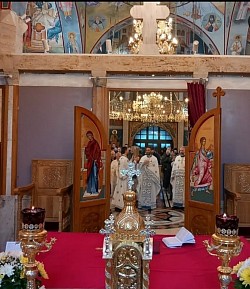 Priest Dejan Vojisavljevic incenses the church during the evening service.