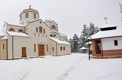 The Church of the Transfiguration of the Lord in a winter idyll completely covered with snow