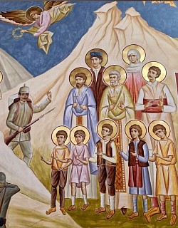 Fresco depictions of holy martyrs in the lower zones of the nave of the temple in Zlatibor