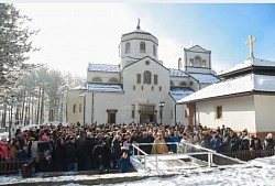 Priest Dejan Vojisavljević during the blessing of water on the Epiphany